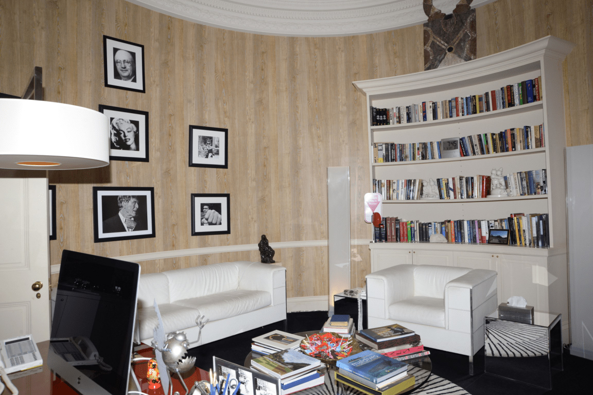Framed pictures on a living room wall